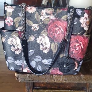 Multi colored, flower patterned handbag
